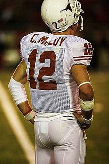 220px Football jersey over shoulder pads Colt McCoy