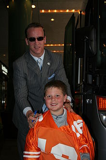 220px Peyton Manning in suit Peyton Manning